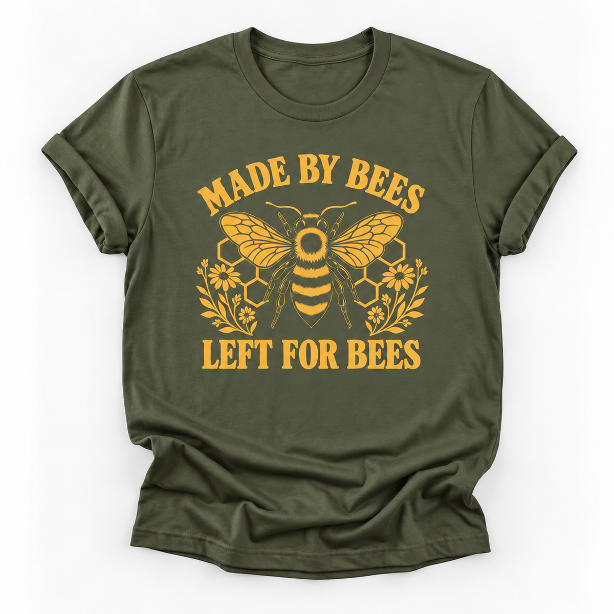Military green short-sleeve t-shirt with a yellow graphic print featuring a bee, honeycomb, flowers, and the text 'MADE BY BEES LEFT FOR BEES' on a white background.
