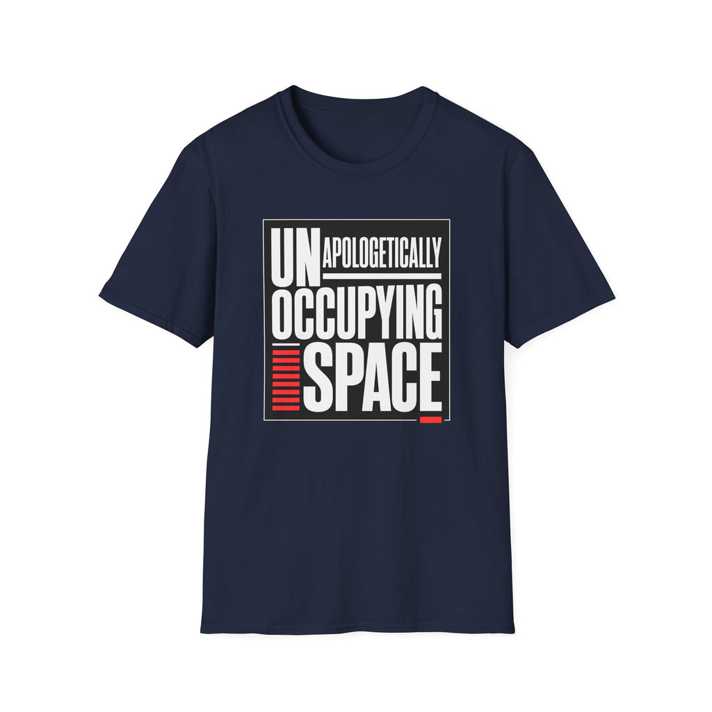 A navy blue short-sleeve t-shirt with a graphic print on the front reading 'UNAPOLOGETICALLY OCCUPYING SPACE' in white and red text inside a black rectangular border, shown on a plain white background.
