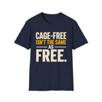 A navy blue short-sleeve crewneck t-shirt with a graphic text print reading 'CAGE-FREE ISN'T THE SAME AS FREE.' in cream and mustard yellow lettering, displayed on a solid white background.