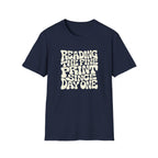 Navy blue t-shirt with text 'reading the fine print since day one'