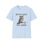 A light blue graphic t-shirt  features a graphic of a owl perched on a branch with the text 'NOT MY FAULT YOU ASKED' in black.