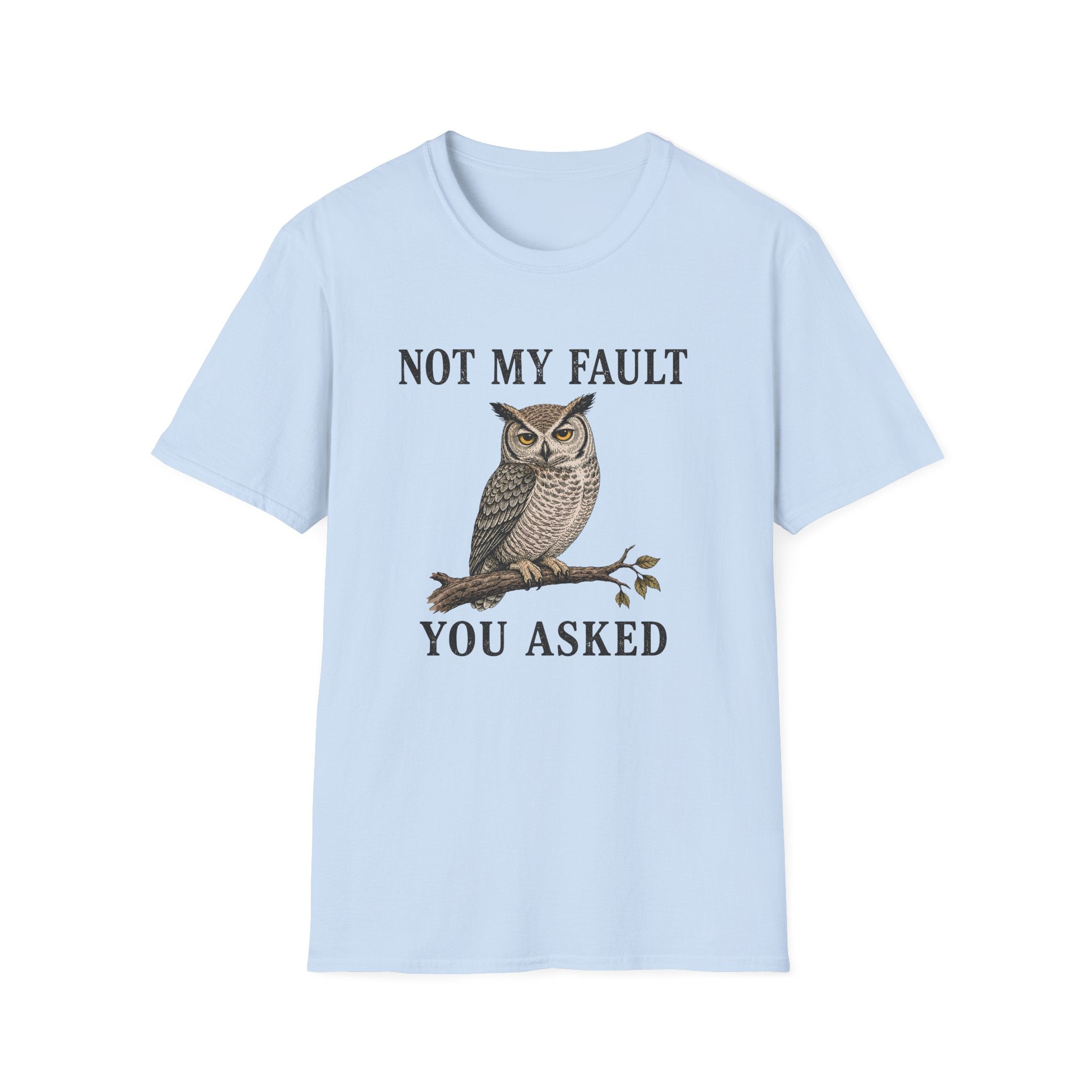A light blue graphic t-shirt  features a graphic of a owl perched on a branch with the text 'NOT MY FAULT YOU ASKED' in black.
