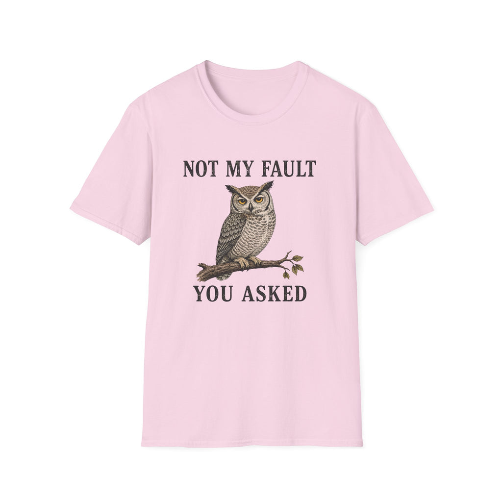 A light pink graphic t-shirt features a graphic of a owl perched on a branch with the text 'NOT MY FAULT YOU ASKED' in black.