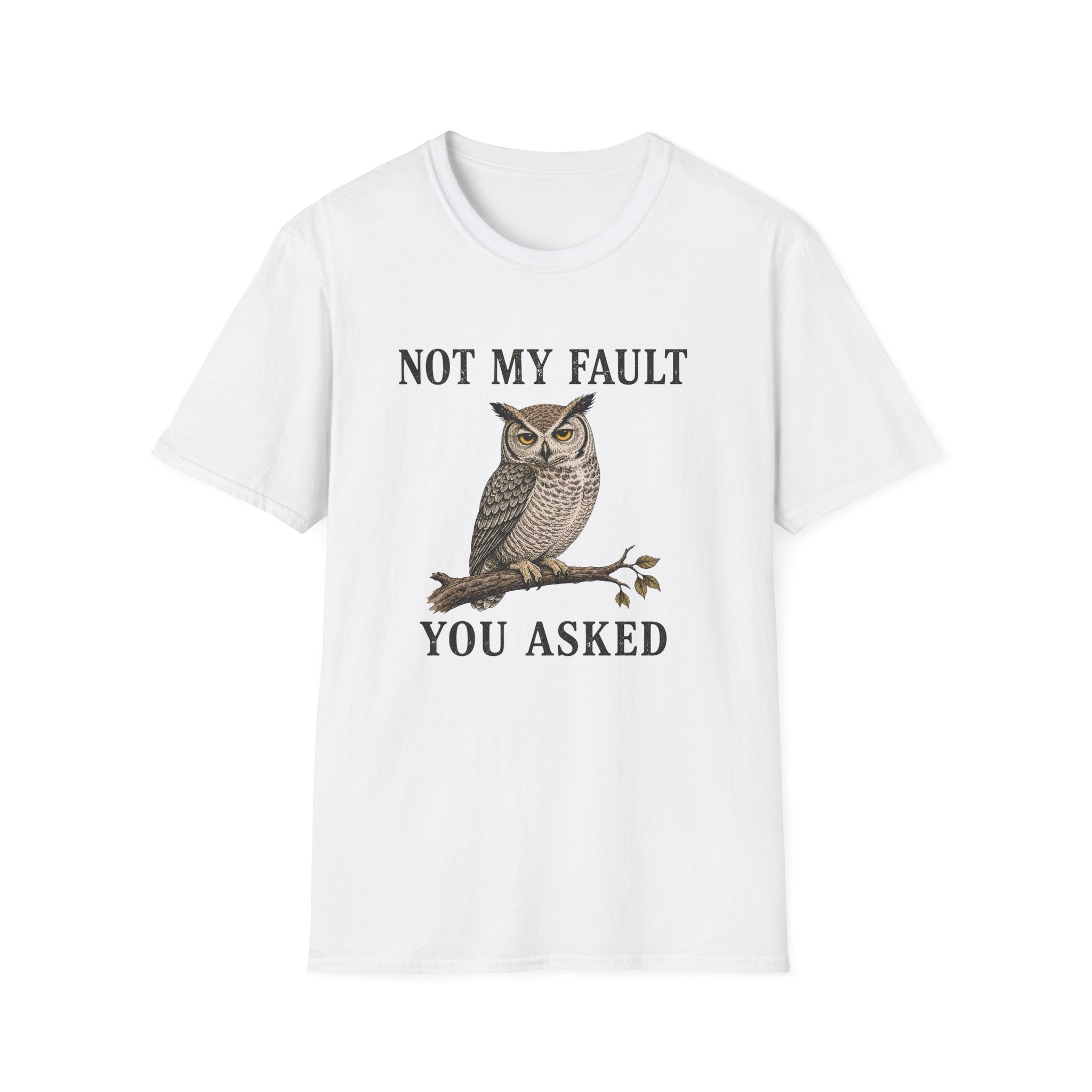 A white short-sleeve crewneck t-shirt featuring a graphic print of a brown owl perched on a branch with the text 'NOT MY FAULT YOU ASKED' in black capital letters.
