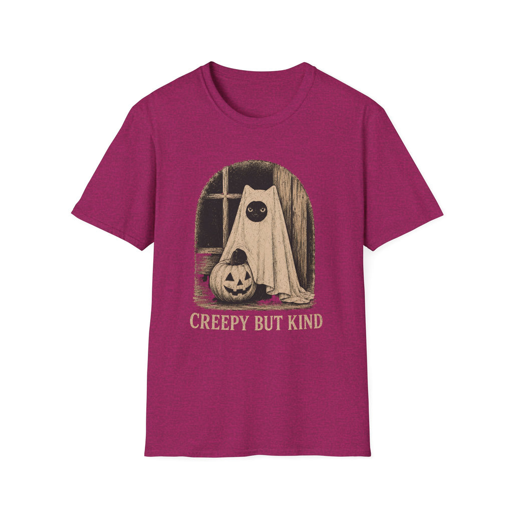A heather magenta short-sleeve t-shirt with a vintage-style Halloween graphic of a ghostly figure in a sheet next to a jack-o'-lantern, with the text 'CREEPY BUT KIND' printed below.