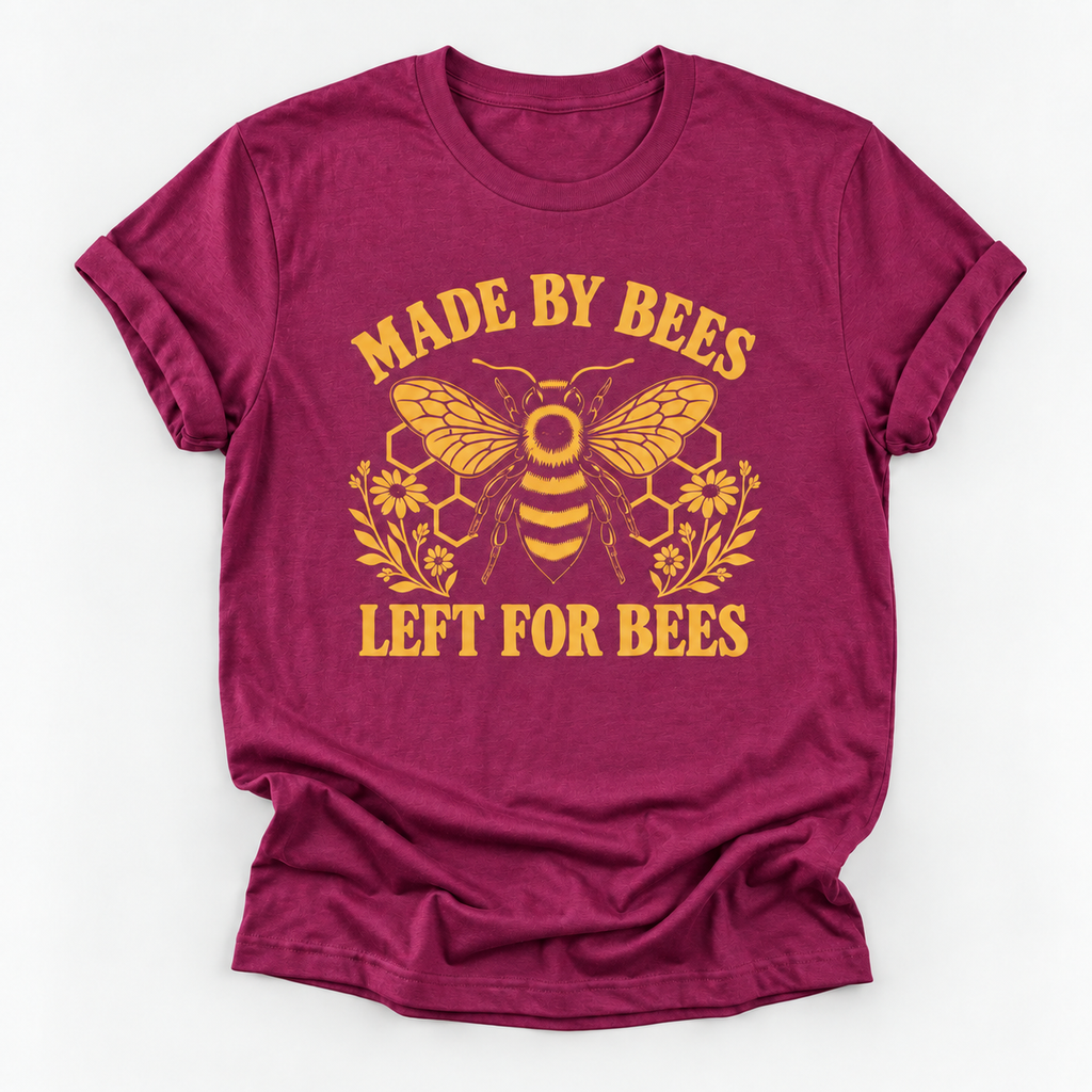 Pink yellow graphic print featuring a bee, honeycomb, flowers, and the text 'MADE BY BEES LEFT FOR BEES' on a white background.