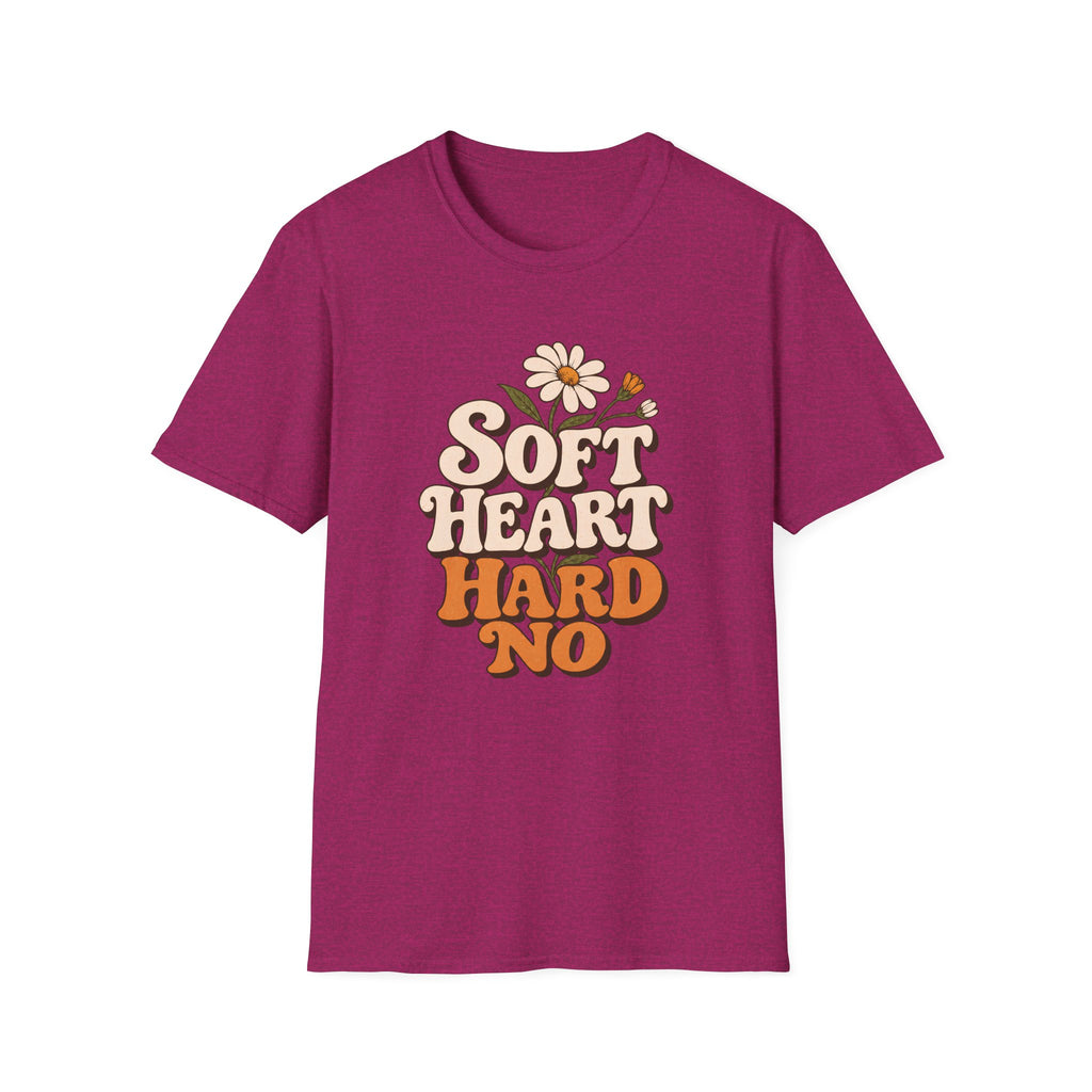 A heather magenta short-sleeve t-shirt with a retro-style graphic on the chest that reads 'SOFT HEART HARD NO' in cream and orange lettering, decorated with a small daisy and bee illustration, shown on a plain white background.
