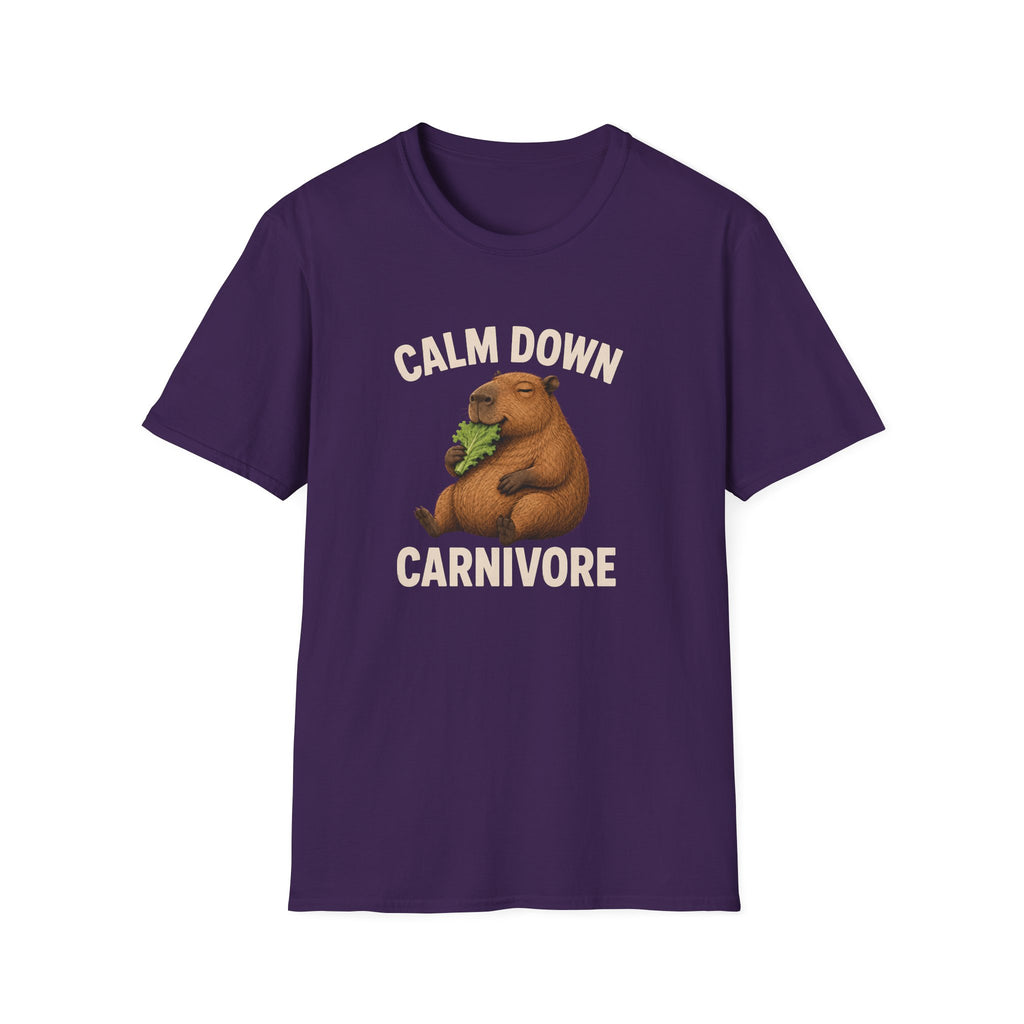 A purple short-sleeve crewneck t-shirt featuring a cartoon groundhog graphic holding green lettuce, with the text 'CALM DOWN CARNIVORE' printed in beige above and below the illustration.