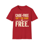 A red short-sleeve crewneck t-shirt with a bold text graphic on the front reading 'CAGE-FREE ISN'T THE SAME AS FREE.' in cream and yellow lettering, displayed on a solid white background.