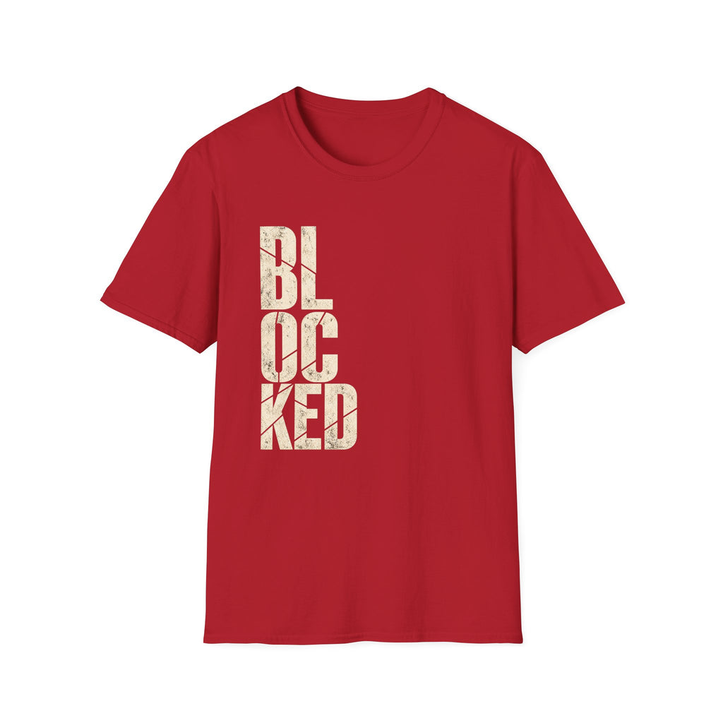 A red short-sleeve crewneck t-shirt featuring the word 'BLOCKED' printed vertically in a distressed, textured cream font on the front, shown against a plain white background.