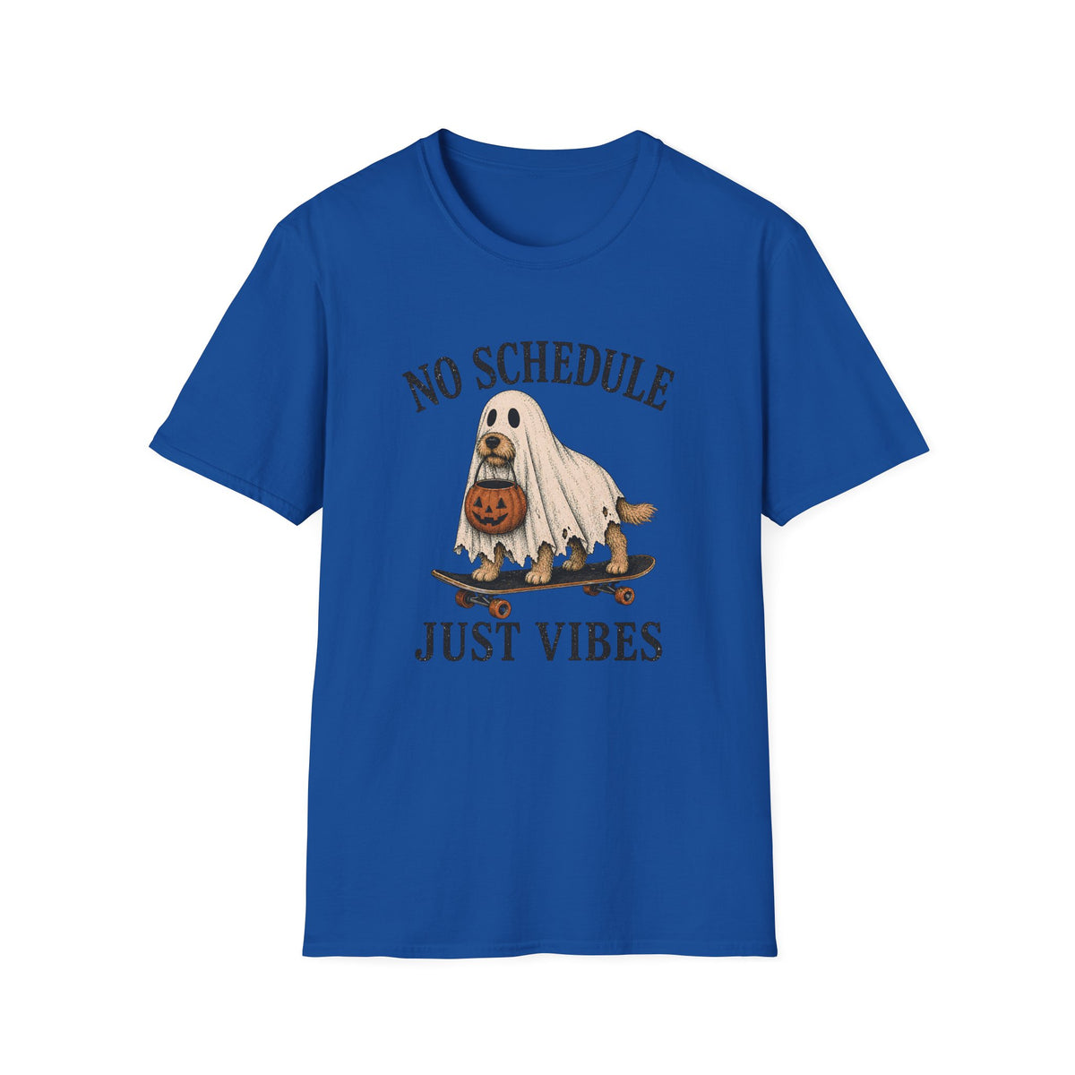 A royal blue short-sleeve crewneck t-shirt featuring a Halloween graphic of a ghost riding a skateboard with a pumpkin, with the text 'NO SCHEDULE JUST VIBES' printed in a distressed dark font.