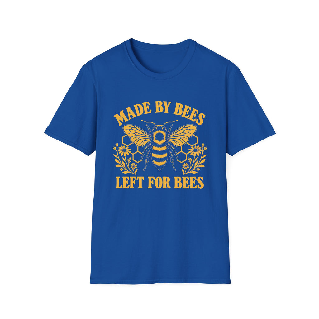 A royal blue short-sleeve crewneck t-shirt featuring a yellow graphic of a bee, honeycomb, and flowers, with the text 'MADE BY BEES LEFT FOR BEES' printed in yellow.