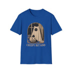 A royal blue short-sleeve crewneck t-shirt featuring a vintage-style Halloween graphic of a ghostly figure with a pumpkin, with the text 'CREEPY BUT KIND' printed below in beige.
