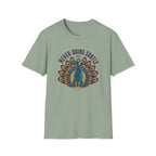 Sage green t-shirt with a peacock design and text 'never doing subtle'