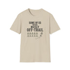 A light beige crewneck t-shirt with a black graphic print on the front that reads 'SOME OF US WERE BUILT OFF-TRAIL' above a trail footprint graphic, shown on a plain white background.