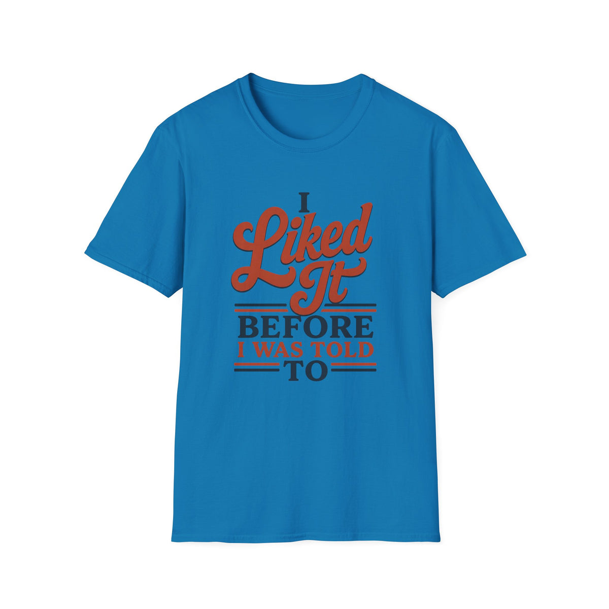 A bright blue short-sleeve crewneck t-shirt with a retro-style graphic on the chest that reads 'I Liked It BEFORE I WAS TOLD TO' in orange and navy blue lettering, displayed on a solid white background.