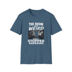 A slate blue crewneck t-shirt with a graphic print on the front. The graphic features white text reading 'THE ROOM GOT WEIRD WHEN I STOPPED AGREING' 