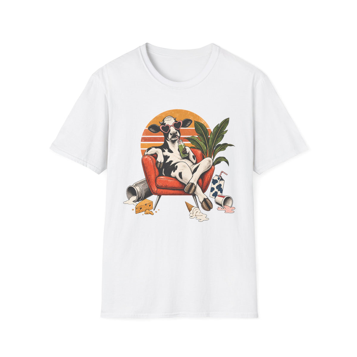 A white short-sleeve crewneck t-shirt featuring a colorful graphic print of a cow lounging in an orange armchair against a sunset background.