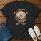 Black t-shirt with frog graphic and text 'in my peaceful era don't test it'