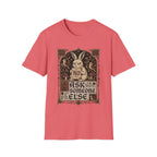 A coral pink short-sleeve t-shirt with a vintage-style graphic of a rabbit holding a sign that says 'NO' surrounded by the text 'ASK SOMEONE ELSE'.