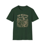 Forest green t-shirt with nature graphic of animals and halloween characters walking up a path and text 'the wildlife isn;t the scary part
