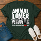 Green t-shirt with animal lover graphic on a wooden surface with jeans and shoes.