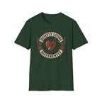 Traditional tattoo-inspired design featuring a heart pierced by a fountain pen with the words "Quietly Living Differently."