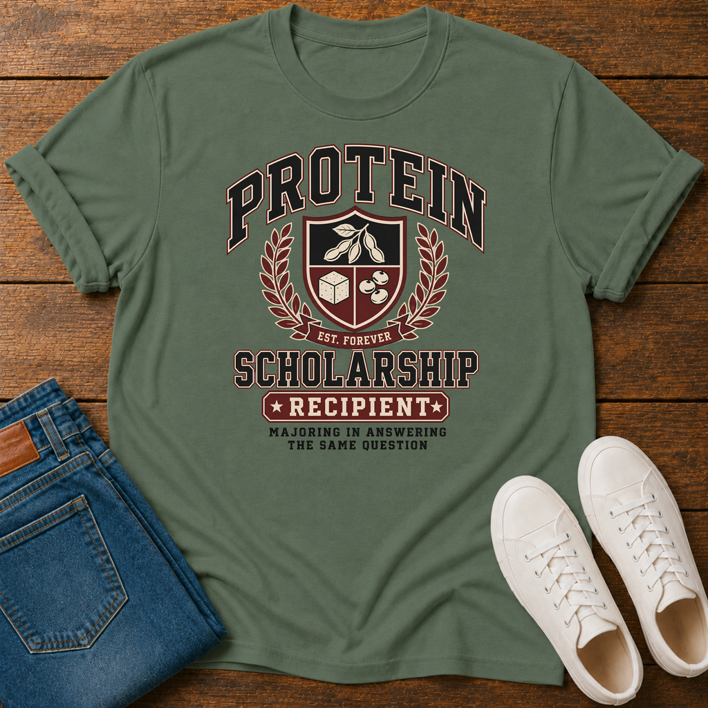 military green t-shirt with Vintage collegiate crest design reading “Protein Scholarship Recipient” with soybean, tofu, and bean illustrations and the words “Majoring in Answering the Same Question.”