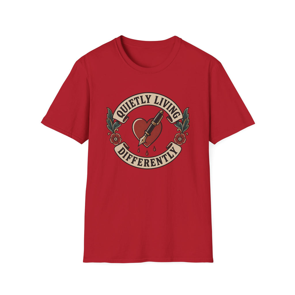 Traditional tattoo-inspired design featuring a heart pierced by a fountain pen with the words "Quietly Living Differently."