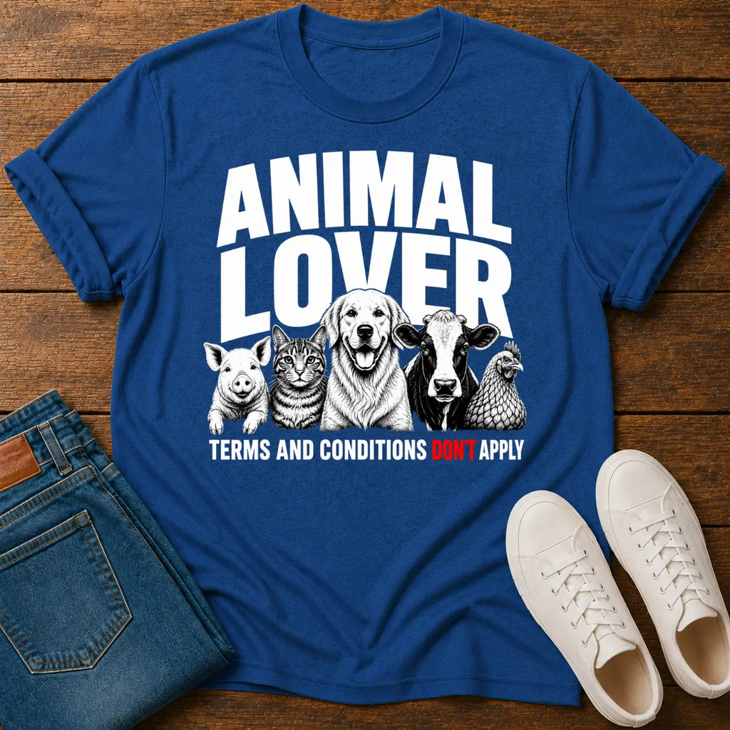 Blue t-shirt with 'Animal Lover' graphic on a wooden surface with jeans and shoes.
