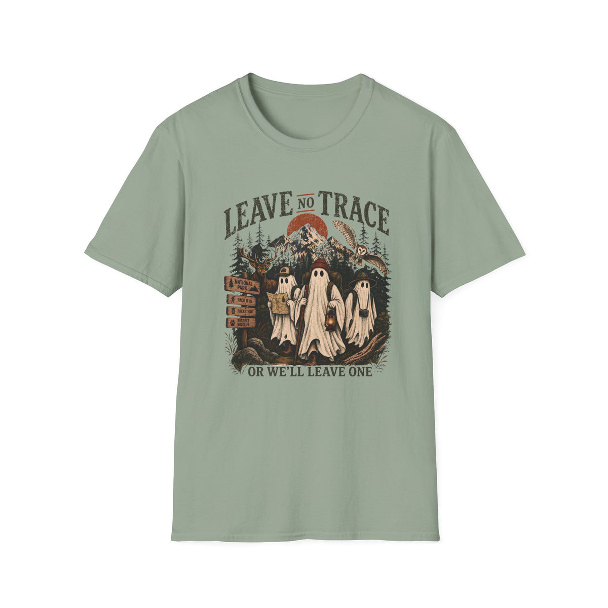 A sage green short-sleeve crewneck t-shirt with a vintage-style Halloween graphic on the front. The graphic features three ghosts in white sheets, a full moon, and the text 'LEAVE NO TRACE' and 'OR WE'LL LEAVE ONE'.