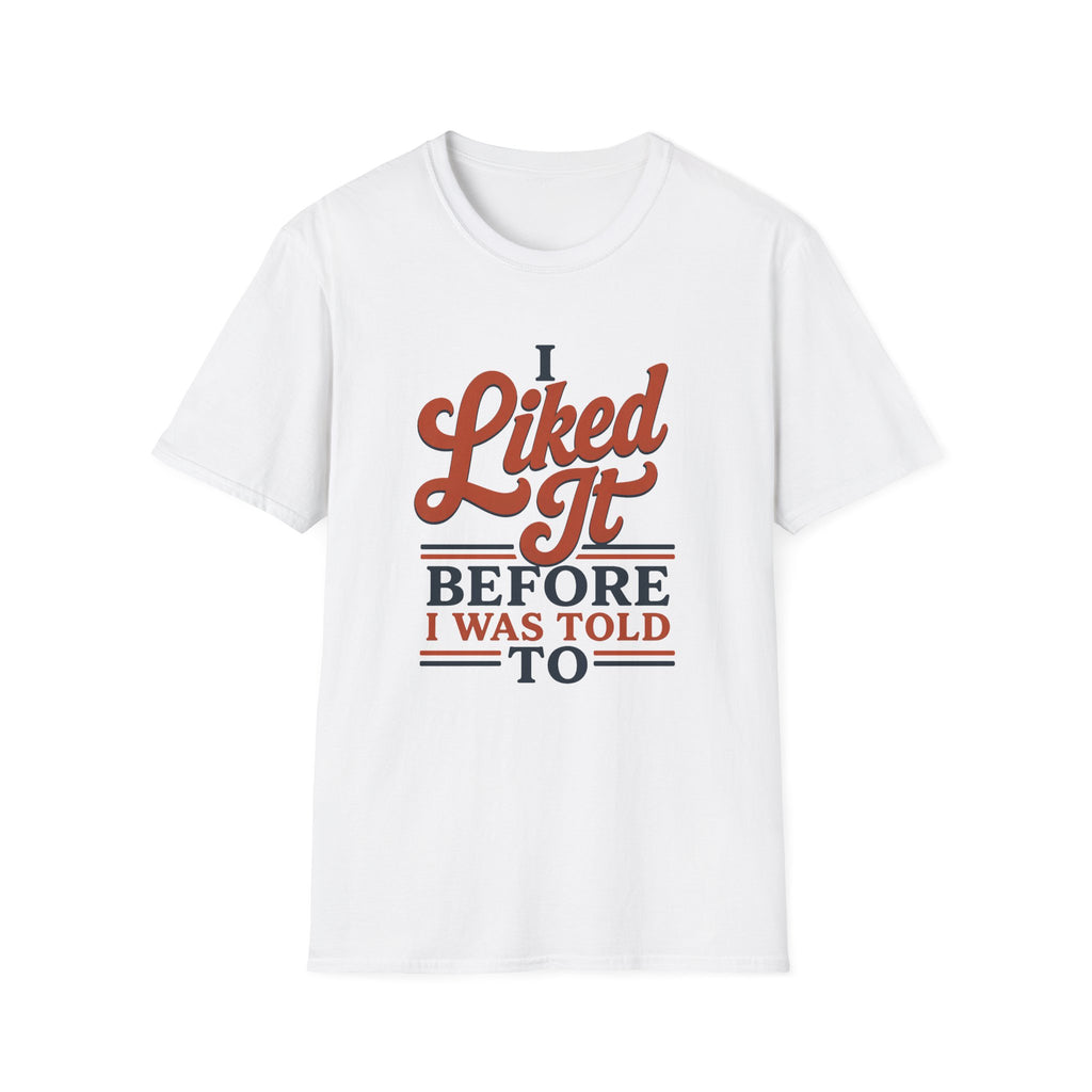 A white short-sleeve crewneck t-shirt with a retro-style graphic on the chest that reads 'I Liked It BEFORE I WAS TOLD TO' in orange and navy blue lettering, displayed against a solid white background.